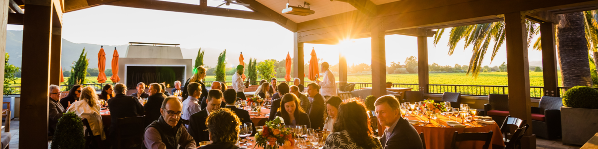 Guests gathered on Terrace at sunset.