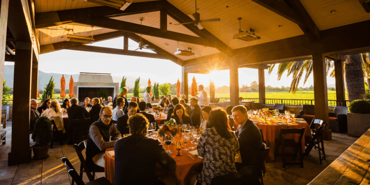 Guests gathered on Terrace at sunset.