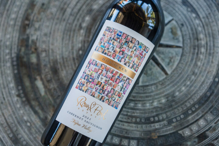 Honouren Cabernet Sauvignon bottle laid down on a concrete surface