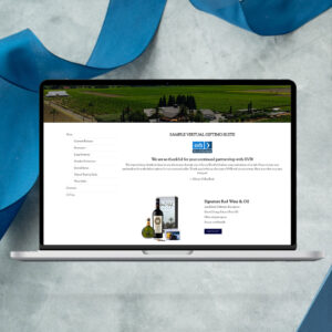 Laptop computer screen displaying a gifting suite on a gray background with blue ribbon coil