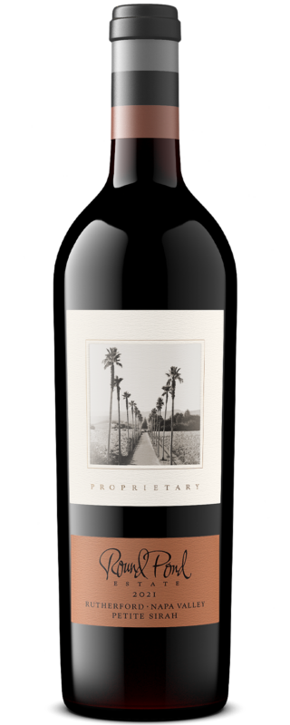 Elegant bottle of Round Pond Estate Napa Valley Petite Sirah wine with a black and white label featuring palm trees.
