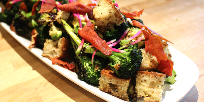 Delicious grilled broccoli and ciabatta crouton salad with fresh vegetables and herbs. Perfect for a healthy, flavorful meal.