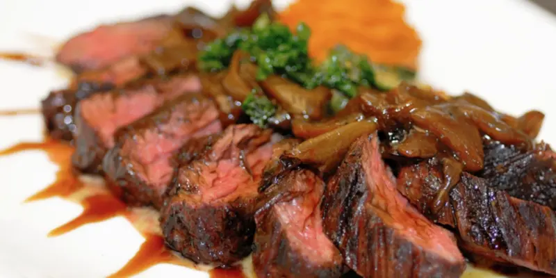 Succulent roasted beef rib eye steak topped with golden chanterelles, served with rich Bordelaise sauce.