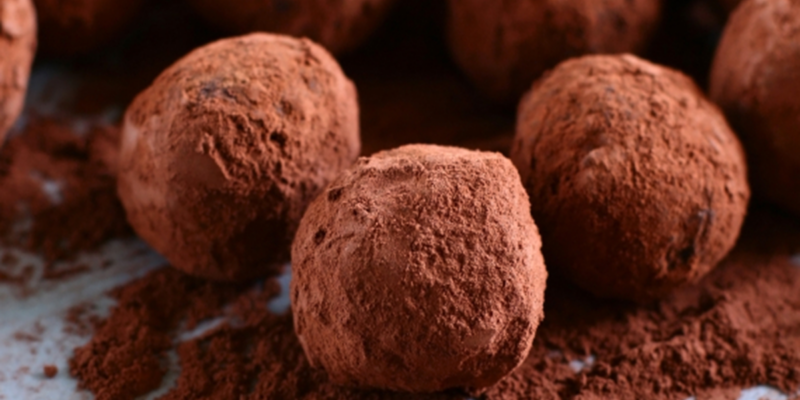 Delicious chocolate and Cabernet truffles coated in cocoa powder, perfect for dessert or gifting.