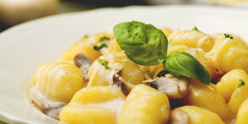 Delicious Parmesan Gnocchi with Mushrooms and fresh basil.
